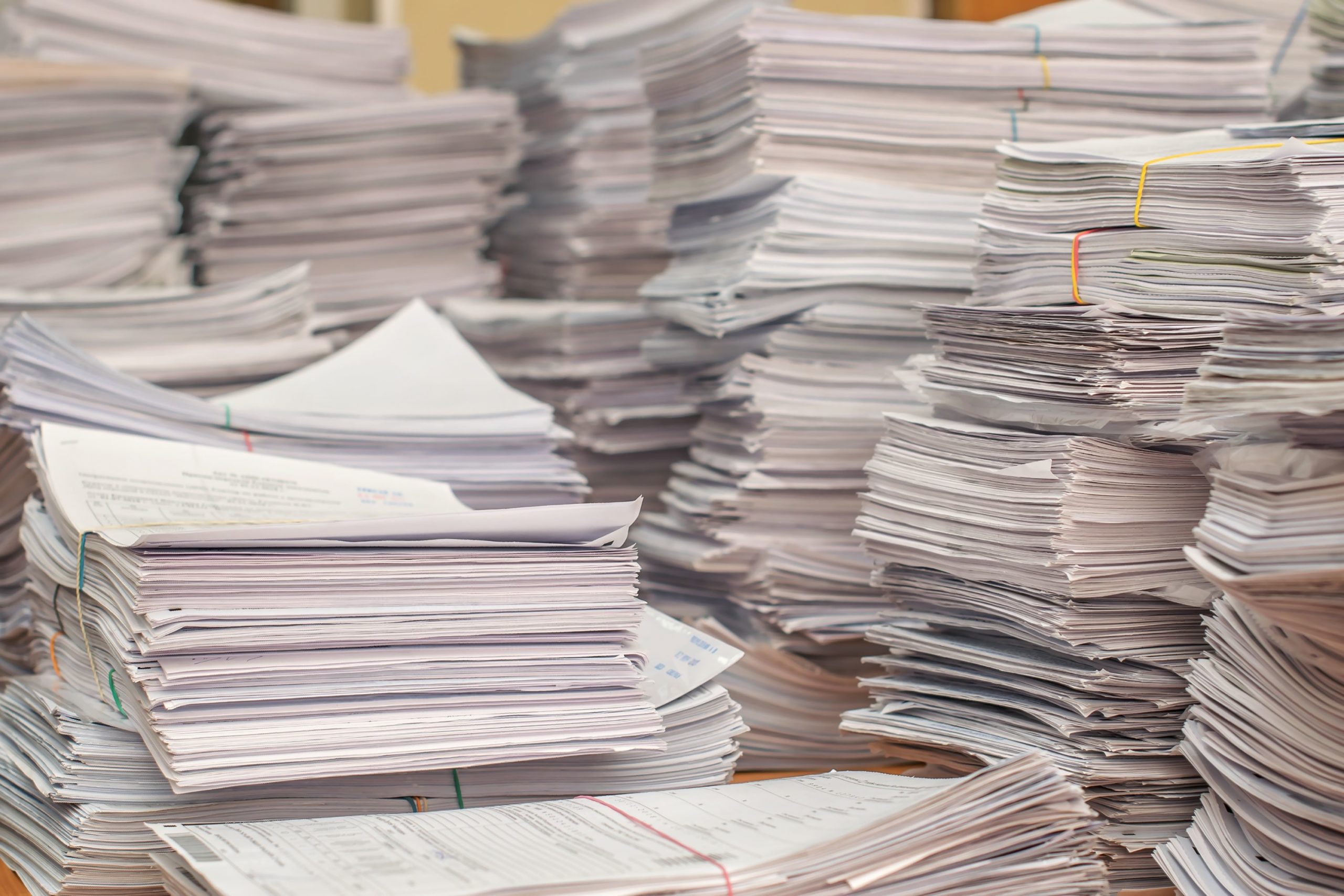 pile_of_paper_documents_in_the_office-scaled[1]